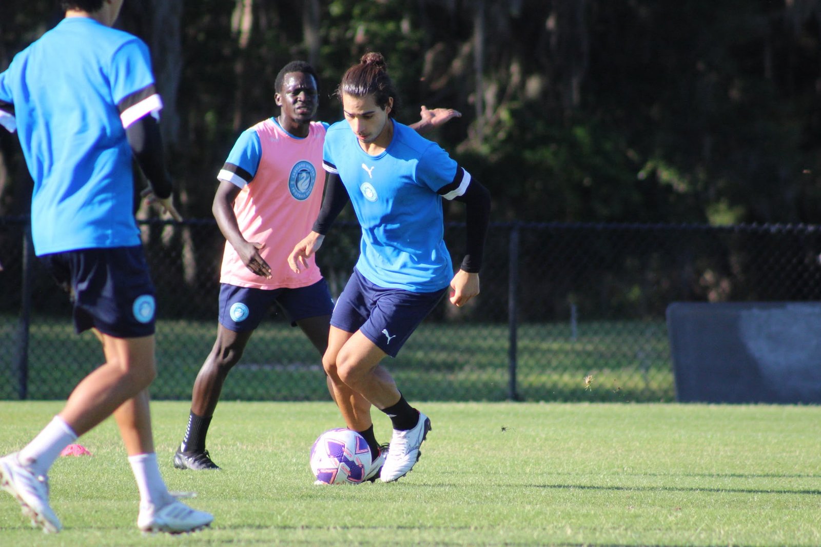 Lucas Lima Policarpo carrying the ball during competitive training